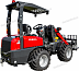 Красный мини-погрузчик Kubota на белом фоне